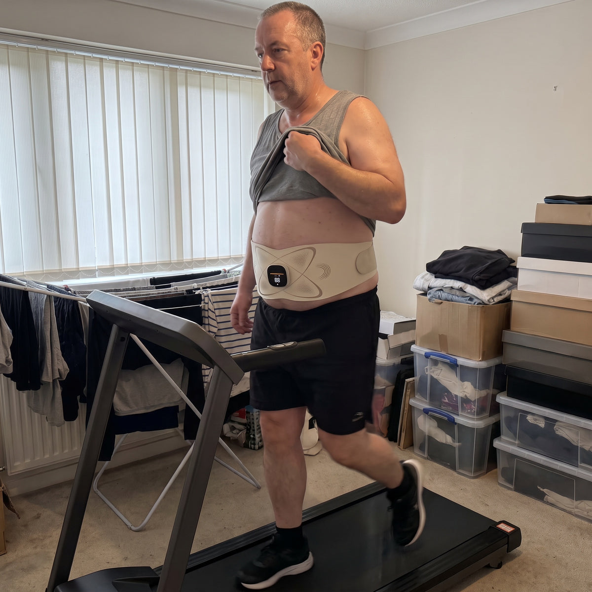 Wearing the Power Belt Pro while walking on a treadmill