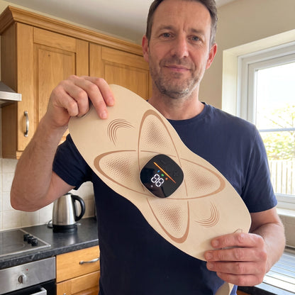 Man holding the Power Belt Pro, showing its full size